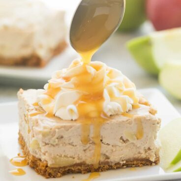 These Caramel Apple Cheesecake Bars are the perfect fall dessert! Loaded with thick caramel sauce, tender apples and covered in a cinnamon brown sugar cheesecake filling!