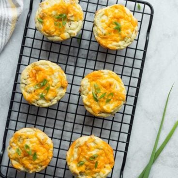My kids LOVE the cheesy surprise in these Cheese Stuffed Mashed Potato Puffs! Leftover mashed potatoes make these SO easy (or use fresh!) -- perfect make ahead side or appetizer for holiday gatherings. https://www.thereciperebel.com/cheese-stuffed-mashed-potato-puffs/