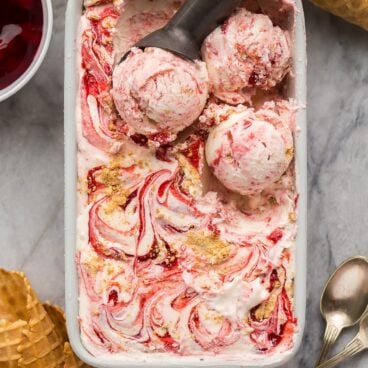 no churn cherry cheesecake ice cream scoops on top of whole