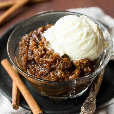 An easy make ahead dessert perfect for the holidays! This spiced Gingerbread Pudding Cake cooks in the slow cooker and keeps your oven free.